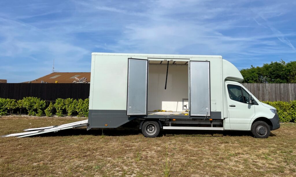 468 Logistics van used to safely transport classic cars, showing side doors and beavertail rear